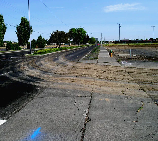 Commercial Parking Lot Sweeping Prevents Long-Term Surface Damage